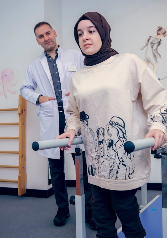 a man and a woman standing next to each other